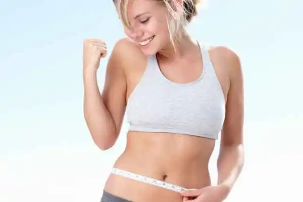woman happy after fat reduction treatment Nottinghamshire